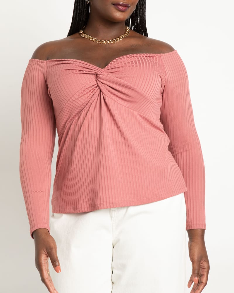 Front of a model wearing a size 26/28 Off The Shoulder Top With Twist in Mesa Rose by ELOQUII. | dia_product_style_image_id:275207